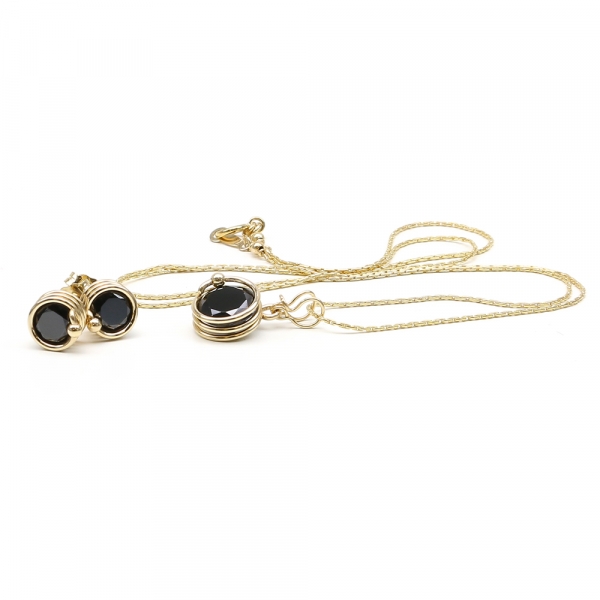 Set pendant, ring  and stud earrings by Ichiban - Busted Black